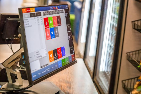 Selecting food options from menu at gas pump